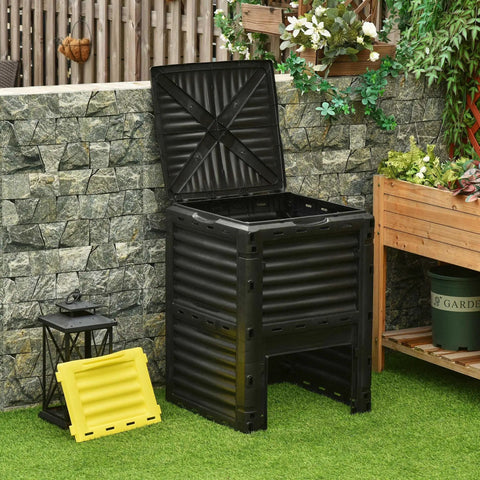 80 Gallon Garden Compost Tumbler Bin With Dual Side Loading Yellow Unit 23.75 By 23.75 By 32 Inch Size in a garden setting