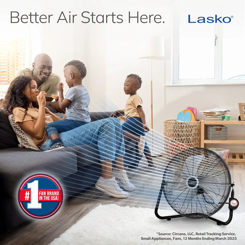 Family enjoying cool air from 20 Inch Black High Velocity Wall Mount Fan With Pivoting Head, in a living room.
