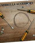 Pro Grade Portable Folding Umbrella Spring Replacement Featuring Slick Auto Pole Mechanism Beast Mode Metal Construction No Sweat Outdoor Travel Gear Fix tools and screws on wooden surface for umbrella maintenance.