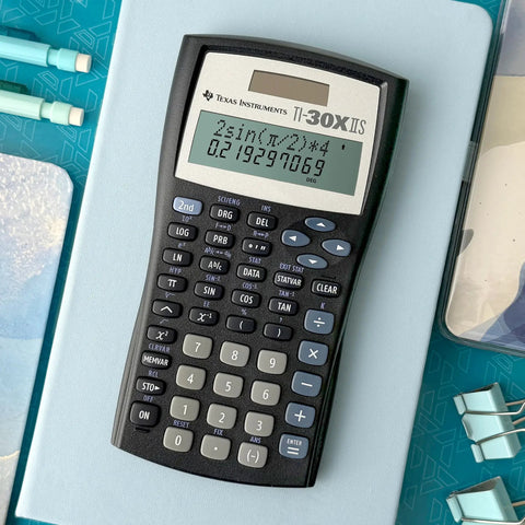 Legit Game Changing Scientific Calculator Featuring Two Line Display Advanced Statistics And Quick Fraction Conversions on a desk