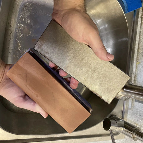 Hands holding Diamond Lapping Plate 220 Grit for Flattening Waterstones and Sharpening Blades Ultra Flat to Under 0.0005 Inches Made in USA
