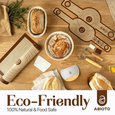 All In One Sourdough Bread Proofing Kit With Lame Danish Whish Bowl And Dough Scraper Two Slings And Baking Mat laid out on table