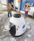 Children playing with Space Capsule Swing For Kids Indoor Outdoor Playhouse Two In One Backyard Playground Set Attaches To A Playset Or Tree Safe And Secure For Ages 3 To 8 Weather Resistant Rope Makes Park Quality Fun At Home in a living room.