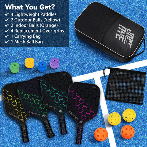 All In One Pickleball Gear Kit With 4 Fiberglass Graphite Paddles, Balls, Bag, and Accessories on blue court surface