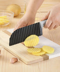 VITUER crinkle cutter with ergonomic gray handle and ribbed black blade for slicing potatoes