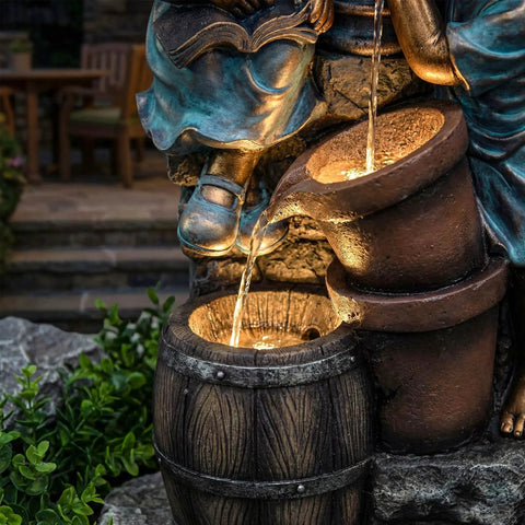 Close-up of 47-Inch Outdoor Water Fountain With 3-Tier Boy And Girl Resin Waterfall, focusing on LED lights and water flow in brown and blue.