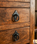 Mystic Colonial Cast Iron Ring Pull Handles With Screw Blackened Hammered Finish on wooden cabinet drawers for rustic style