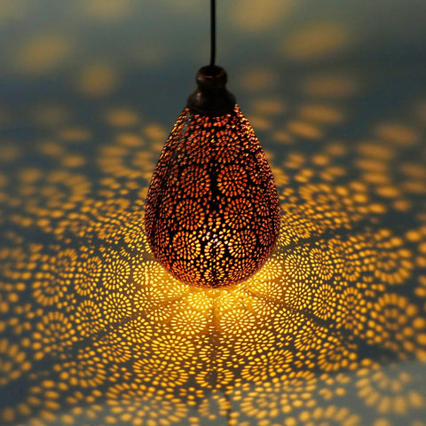 2 Pack Solar Hanging Lanterns With Raindrop Shape, Warm White LED Glow, Retro Iron Antique Bronze Finish casting light patterns