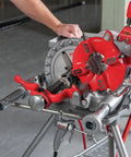 Model 300 Power Drive Complete Pipe Threading Machine, 38 RPM, shown with alloy die heads, oiler, stand, and tray in a workshop
