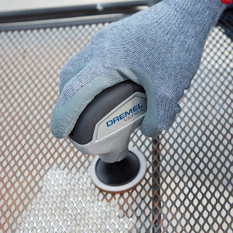 Cordless Power Scrubber Auto Detailing Kit With Four Cleaning Pads, Bristle Brush, Splash Guard, And Charger on metal surface