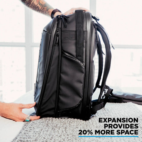 Peter McKinnon Collab Camera Pack Expandable 35L To 42L Travel DSLR Backpack side view showing expansion for more storage space.