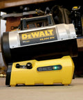 68000 Btu Portable Cordless Propane Space Heater With Battery Start And Quiet Forced Air Barrel Design For Job Sites Garages And Covered Patios, DEWALT brand with a yellow base.