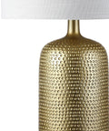 Gold Modern Resin Table Lamp 30 Inch Tall With White Linen Drum Shade Glam Contemporary Bedside Light For Living Room And Bedroom UL Listed LED Bulb Included Easy Plug In Vibe with textured gold base and white shade.