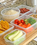 16 Piece Clip Lock Food Storage Set with Airtight Lids For Meal Prep And Kitchen Organization, showing containers with food.