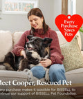 Woman sitting on a couch with a rescued dog named Cooper, promoting pet rescue support with a heart-shaped donation sign.