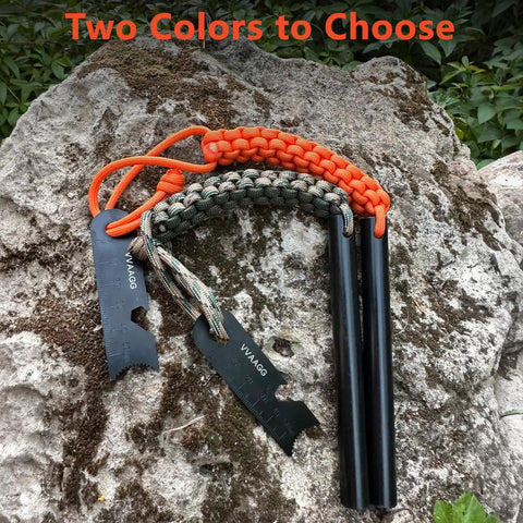 Two Four Inch Long Ferro Rod Fire Starter Kits With Orange Paracord Lanyard Handles And Strikers On Rock Surface