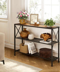 Hella Sturdy Industrial Console Table With Three Tier Open Shelving Slick Black Metal Frame And Rustic Brown Wood Top For Narrow Entryways Hallways Behind Sofa Spots, displaying flowers and decor.