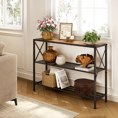 Hella Sturdy Industrial Console Table With Three Tier Open Shelving Slick Black Metal Frame And Rustic Brown Wood Top For Narrow Entryways Hallways Behind Sofa Spots, displaying flowers and decor.