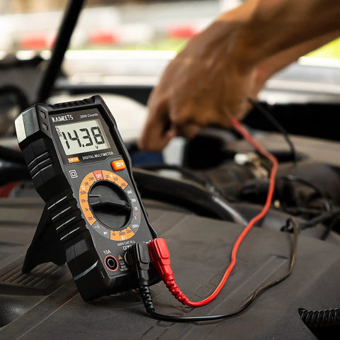 Digital Multimeter With Carrying Case For Home And Auto Use Tests DC And AC Voltage showing 14.38 volts on a car battery