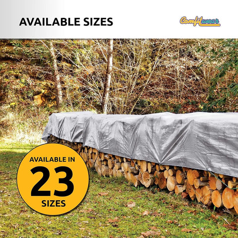 Heavy Duty 12 By 25 Foot Silver And Black Waterproof UV Blocking 10 Mil Poly Tarp covering stacked firewood outdoors