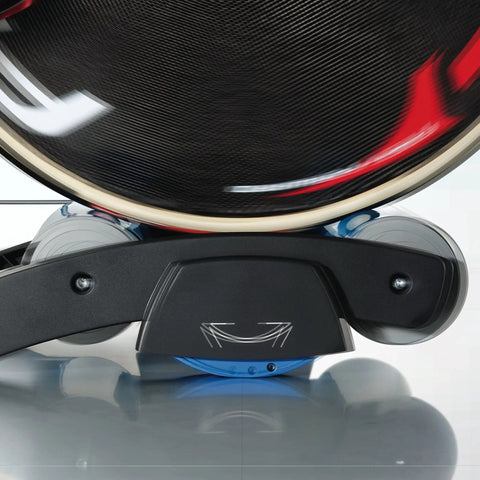Close-up of Indoor Bicycle Rollers With Foldable Retractable Design for at home gym, showing conical centering rollers and swing system.
