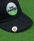 Berry Inspired Golf Ball Marker With Alignment Marker For Putting Green Metallic Ball Marker Accessory placed on black cap
