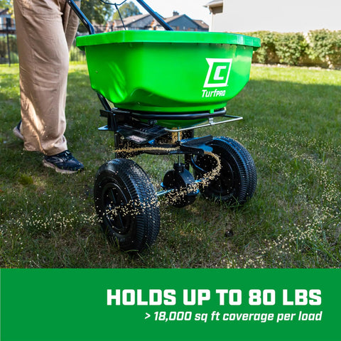 80 Pound Lawn And Garden Broadcast Spreader With Weatherproof Poly Hopper Walk Behind Push Spreader For Fertilizer And Seeds 10 Inch Tires Pull Bar Lever With 15 Setting Gate Built Tough Yard Work Essential on grass lawn