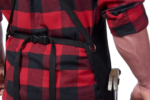 Back view of person wearing Deluxe Waxed Canvas Tool Apron For Men And Women With Removable Padded Straps And Dual Hammer Loops