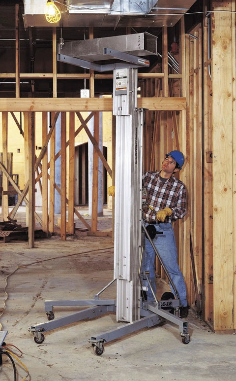 Heavy Duty Material Lift With Steel Forks 650 Lb Capacity 18 Ft 6 In Lift Height One Person Operation used in construction site