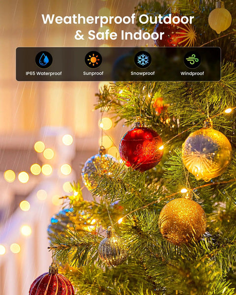 Two Pack 66 Ft Solar Fairy Lights With 200 LEDs In Warm White Outdoor Waterproof String Lights With 8 Modes For Patio Garden Yard Fence Christmas Decor No Fuss Setup And Auto On At Dusk; lights on a decorated Christmas tree outdoors