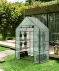 Spacious 3 Tier Walk In Greenhouse Kit With 6 Shelves And Durable PE Cover in garden setting, 56 x 28 x 76 inches