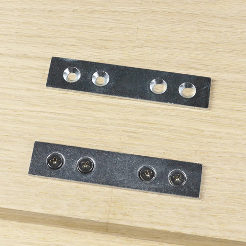 Pack of 8 Heavy Duty Galvanized Steel Mending Plates for Tight Woodworking Panel Joints; 3.5 by 0.75 inch, shown on wood surface.