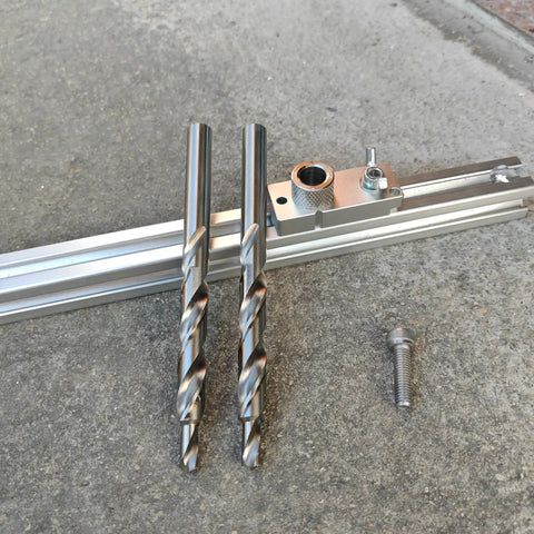 Heavy Duty M2 HSS Countersink Step Drill Bits Pack Of Two With Anti Walk Split Point For Smooth Glides And Zero Skip Action On Stainless Steel Aluminum And Hardwood on a workbench.