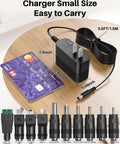 5V 1A Power Supply With 10 Interchangeable Jacks, black compact charger with 1.5m cable and assorted adapters