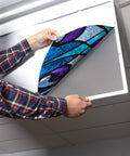 Installing fluorescent light cover with stained glass design on 2x4 ceiling fixture, 22.38x46.5 inches, classroom friendly
