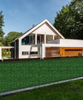 Boxwood Hedge Wall Panels 24 Pack 20x20 Inch Realistic Thick Artificial Greenery Backdrop installed as modern house privacy screen