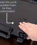 Person customizing foam insert in Hard Shell Wireless Microphone Case With Customizable Foam Insert For Sennheiser Shure Audio Technica Nady And VocoPro Receivers And Transmitters Built For Rugged Travel Gig Ready Protection.