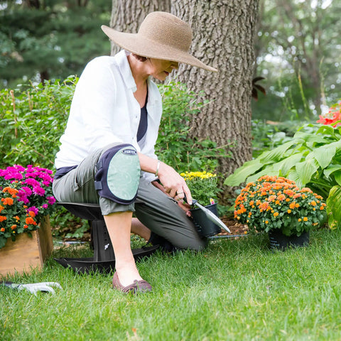 Woman using Premium Garden Rocker With Cushion, Cover And Pockets For Easy Weeding And Planting Tool, Ergonomic, Model GB1227 outdoors