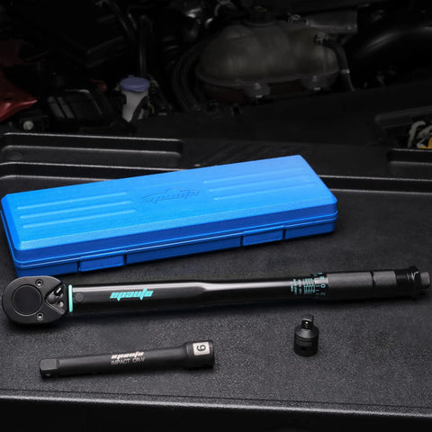 1/2 Inch Drive Click Torque Wrench That Delivers 10-150 Ft-Lb Range And 13.6-203.5 Nm, with blue case on black surface