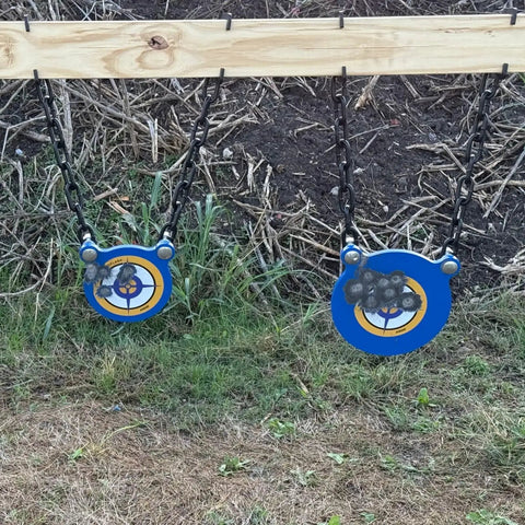 AR500 Steel Target Set With One Half Inch Thick Gongs For Shooting mounted with chain strap in backyard or range