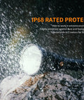 Long-Range Rechargeable Hunting Flashlight 1500 Lumen With 1011 Yards Reach under heavy rain showcasing IP68 protection