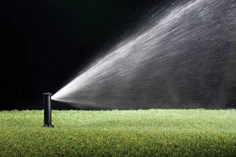 Pro Grade Gear-Drive Rotor With Rain Curtain Nozzles Set installed on lawn, 40 to 360 degree pattern, spray radius 19 to 32 feet
