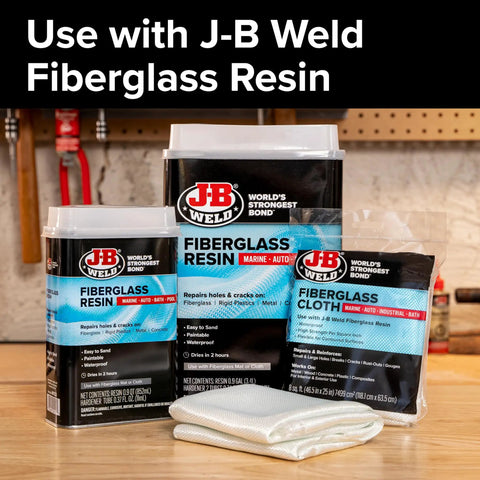 Fiberglass Cloth Repair Kit 8 Sq Ft 46.5 By 25 Inches with J-B Weld resin on a wooden table