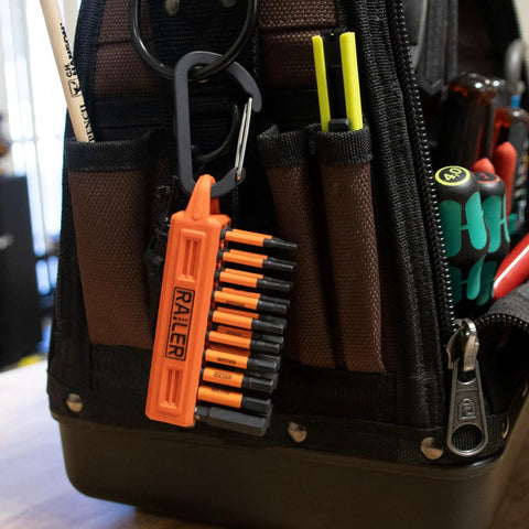 Beefy 20 Piece Impact Driver Bit Set in Premium S2 Steel with hex shank and carabiner clip on a tool bag