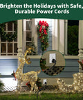 Outdoor holiday scene with 3 Prong Y Splitter Extension Cord One Foot Straight Plug To Two Outlet Space Saver For Indoor Outdoor Use Heavy Duty Weatherproof SJTW 16 AWG 13 A UL Listed Cable Extender connecting lighted decorations