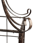 Close-up of decorative metalwork on the Seven And A Half Foot Tall Iron Garden Obelisk Trellis For Climbing Roses Clematis And Jasmine Heavy Duty 77 Lb