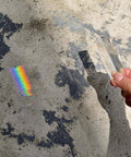 Equilateral Crystal Prism Set in 1 Inch 2 Inch and 4 Inch Sizes for Physics Teaching, rainbow refraction on concrete surface