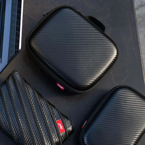 Slick Carbon Look Eva Tech Cable Organizer With Secure Mesh Pockets And Stretchy Elastic Bands For Phones Chargers And Power Banks Black.