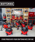 Craftsman wet/dry vacuums displayed in a workshop with various sizes and models, showcasing versatility and brand quality.