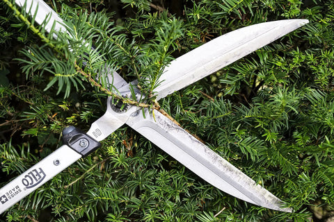 F25057 Swiss Made Hedge Shears For Gardening 22 Inch Lightweight Precision Clippers trimming green shrub branch